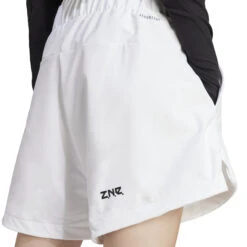 Damesshort Adidas Z.N.E. Woven 12 Damesshort Adidas Z.N.E. Woven -Moss Kopenhagen-winkel adidas in9481 7 apparel on model detail view 2 white